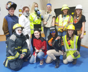 Totally Trades participants dressed up for a fashion show