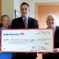 Brian King of Bank of America presents check to Gilda Nardone, Executive Director, (right) and Jean Dempster, Program Manager (left) to support Career and College Success Initiative.