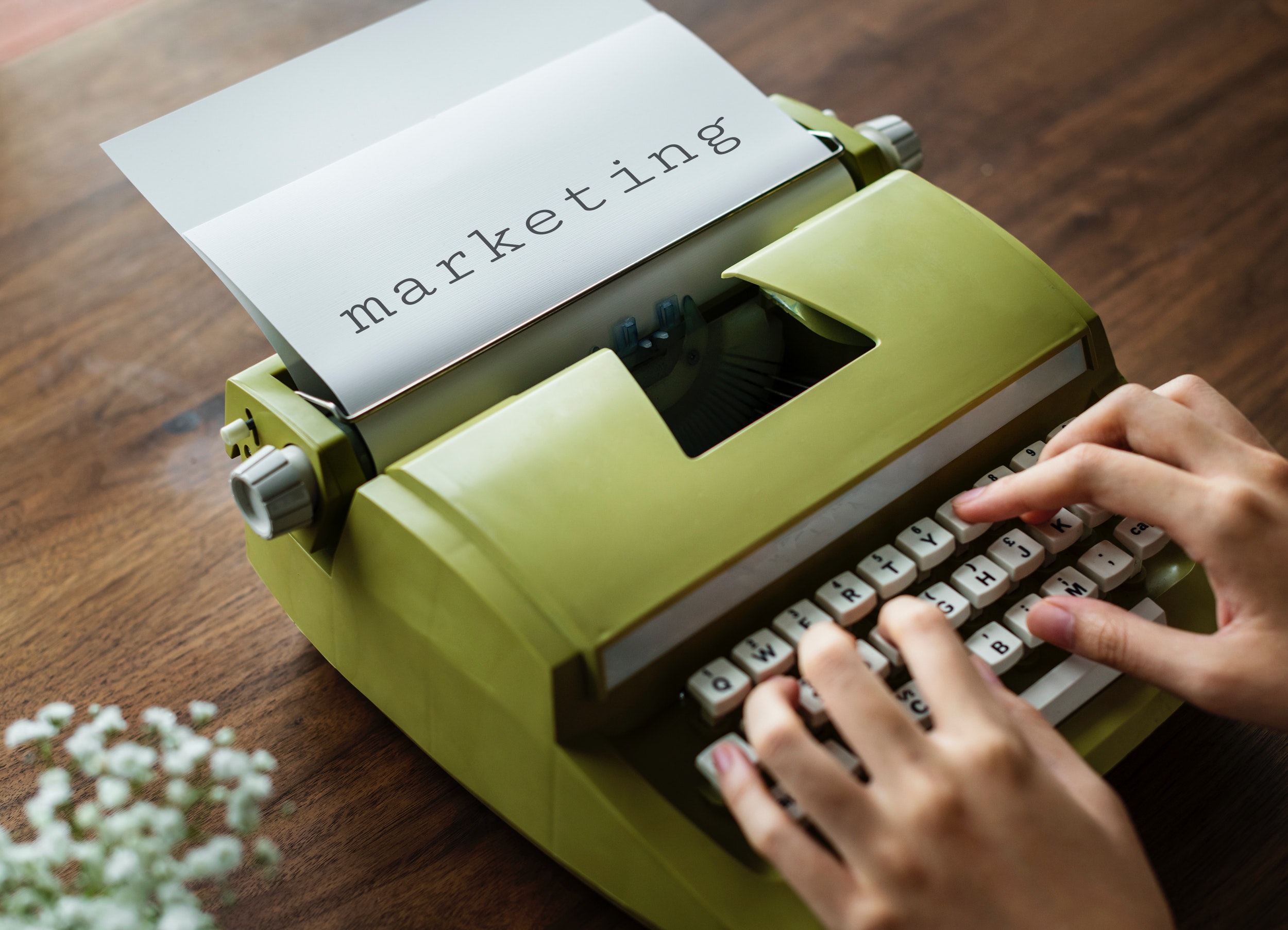 Marketing typed on a typewriter 