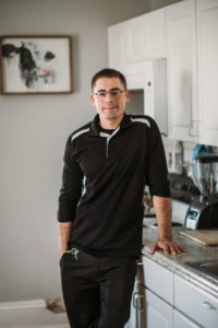 Jeff standing in his kitchen