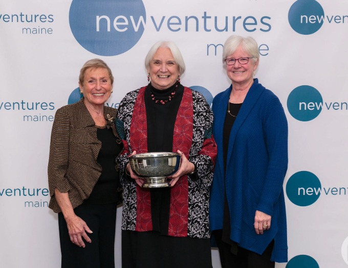 Formal photo of Gilda Nardone holding Merle Nelson Women Making A Difference Award (bowl) with Merle Nelson (L) and Barbara Trafton (R)