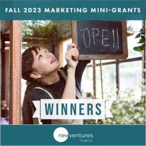 photo of shopkeeper hanging OPEN sign with label at top: Fall 2023 Marketing Mini-Grant WINNERS banner