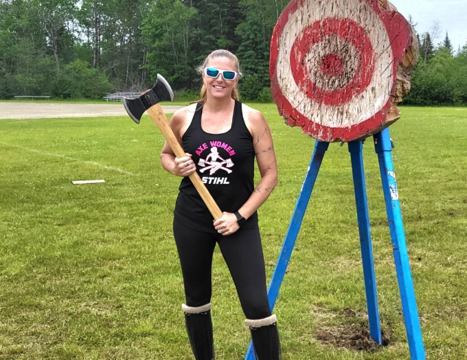 Axe thrower by target photo