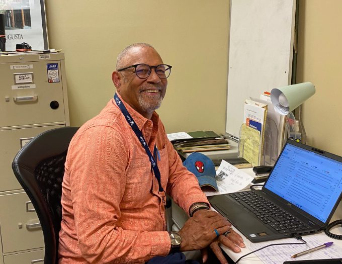 Photo of Nolan Thompson in his NVME office in Augusta