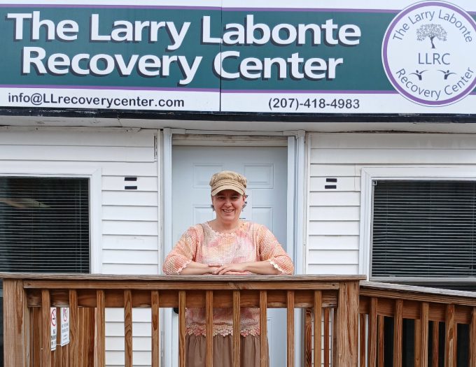 photo of Veronica standing in front of Larry Labonte Recovery Center