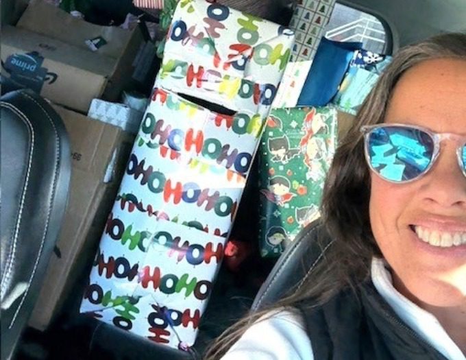 Lisa Sweet with her SUV packed with gifts